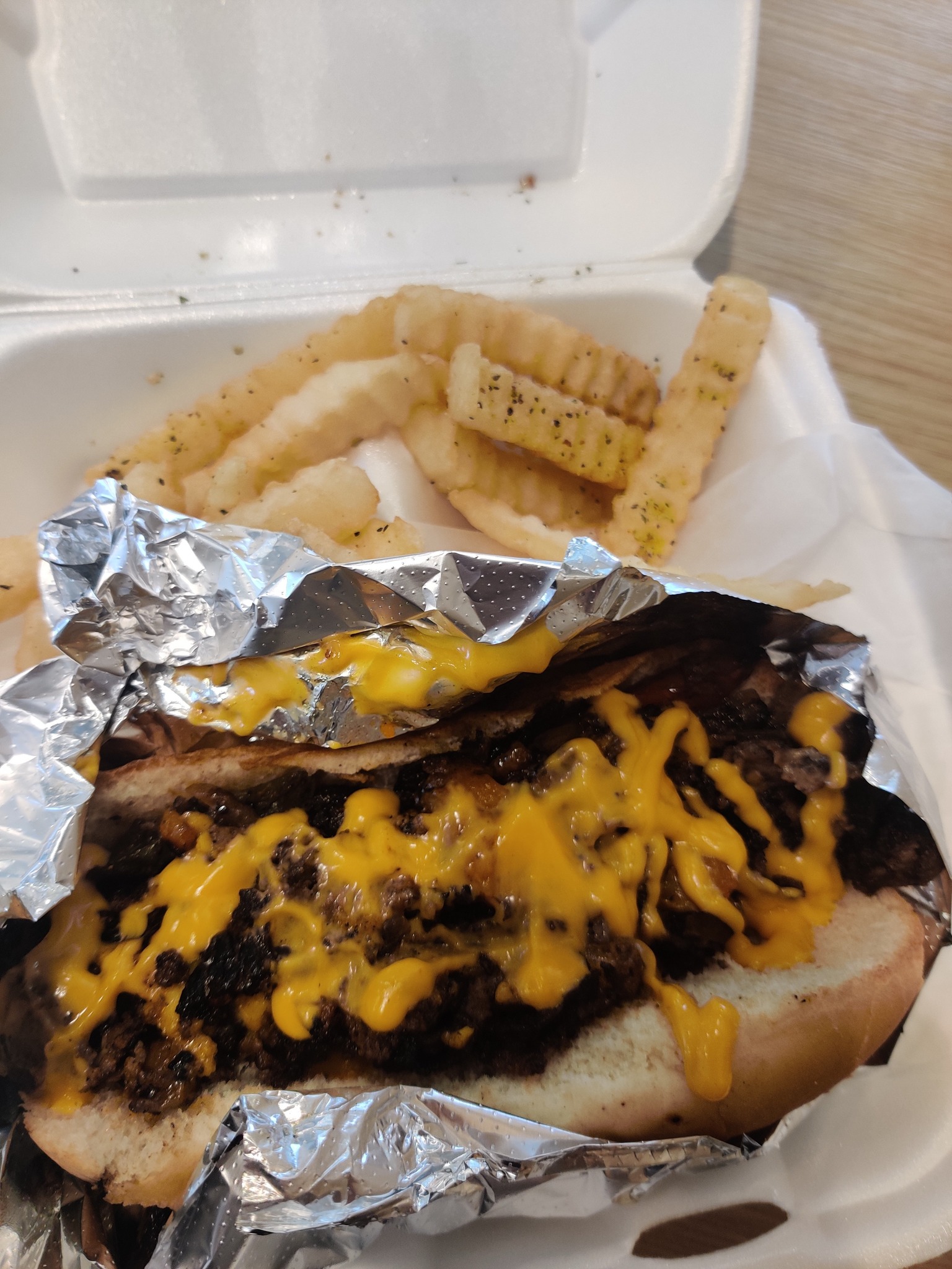 Philly sandwich with fries from a local food truck